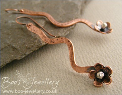 Antiqued copper squiggle drop and flower earrings