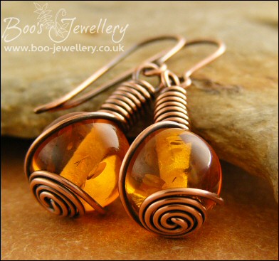 Faux amber and antiqued copper rosebud knot earrings