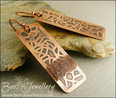 Etched copper earrings with random geometric design