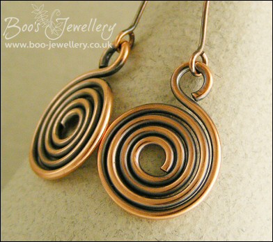Antiqued copper round profile spiral earrings
