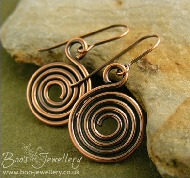 Antiqued copper round profile spiral earrings