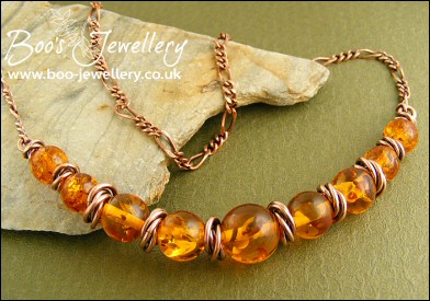 Faux amber and copper necklace with mobius ring separators - made to order