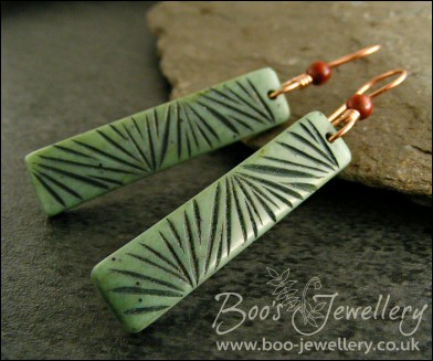 Faux carved jade stick earrings with red jasper beads