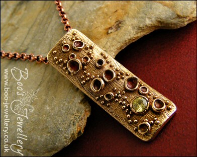 Bronze bark pendant featuring tiny resin filled cup fungi