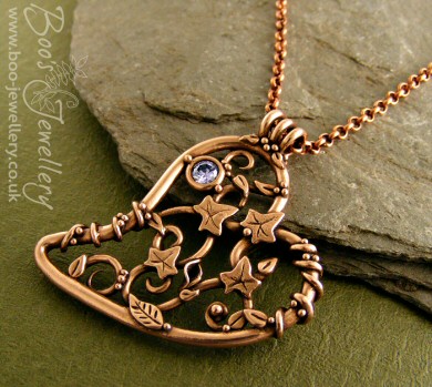 Filigree heart pendant with ivy leaves, berries and a CZ gemstone