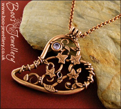 Filigree heart pendant with ivy leaves, berries and a CZ gemstone