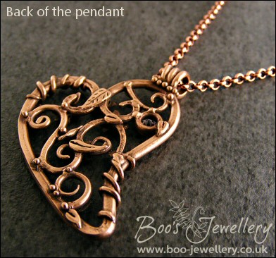 Filigree heart pendant with ivy leaves, berries and a CZ gemstone