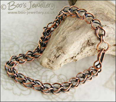 RESERVED:  Antiqued copper loop in loop bracelet with hook clasp