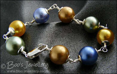 Large glass pearl and silver plated bracelet