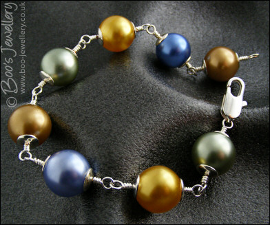 Large glass pearl and silver plated bracelet
