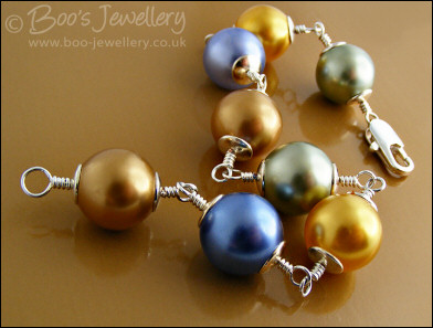 Large glass pearl and silver plated bracelet