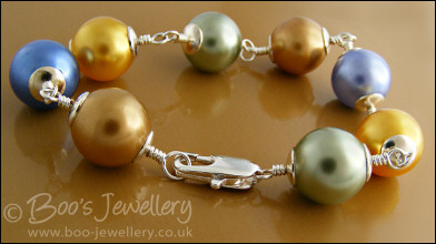 Large glass pearl and silver plated bracelet