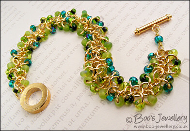 Gold plated beaded bracelet & earrings in greens