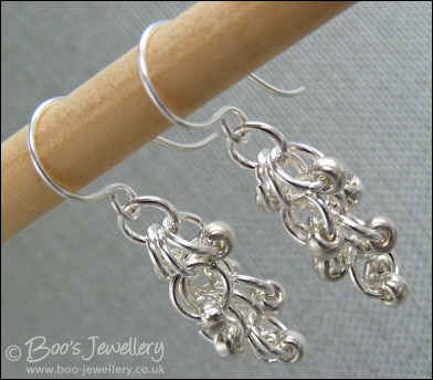 Silver plated shaggy loops bracelet and earrings