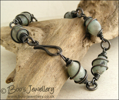 Antiqued copper and sesame jasper spiral wrapped bracelet