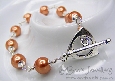 Copper seashell pearl toggle bracelet in Sterling silver