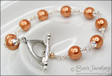 Copper seashell pearl toggle bracelet in Sterling silver