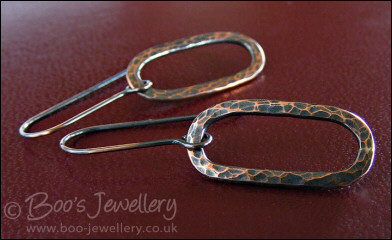 Hammered and oxidised copper long oval earrings