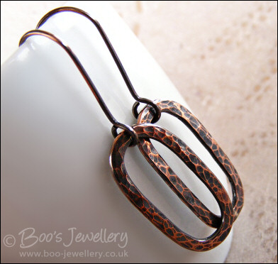 Hammered and oxidised copper long oval earrings