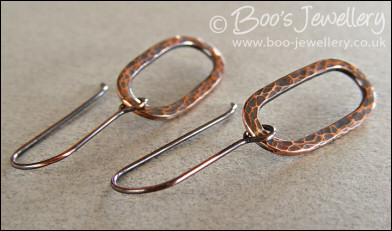 Hammered and oxidised copper long oval earrings