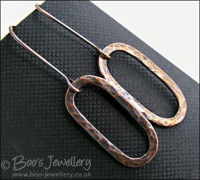 Hammered and oxidised copper long oval earrings