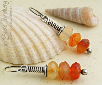 Sterling silver long wrap earrings with faceted Carnelian rondelles