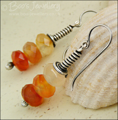 Sterling silver long wrap earrings with faceted Carnelian rondelles