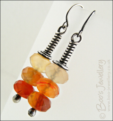 Sterling silver long wrap earrings with faceted Carnelian rondelles