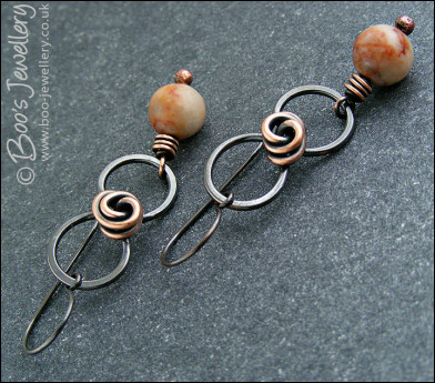 Oxidised figure of 8 copper earrings with rosebud knot