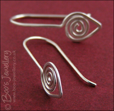Polished silver spiral leaf, one piece earrings