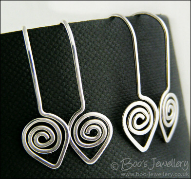 Polished silver spiral leaf, one piece earrings