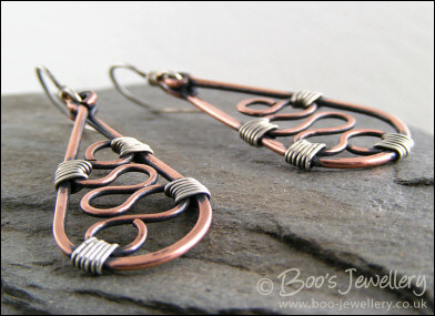 Squiggle filled teardrop earrings in copper and silver