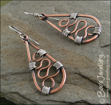 Squiggle filled teardrop earrings in copper and silver