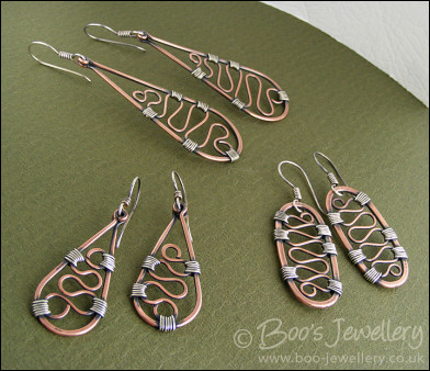 RESERVED - Copper circle pendant with Sterling silver wrapped details