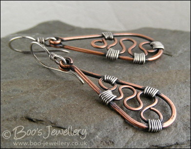 Squiggle filled teardrop earrings in copper and silver