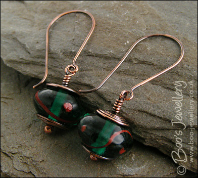Oxidised copper with green glass long drop earrings