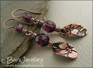 Amethyst coloured crystal and flower charm earrings