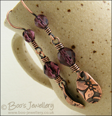 Amethyst coloured crystal and flower charm earrings