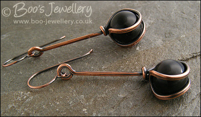 RESERVED - Antiqued copper loop capture earrings
