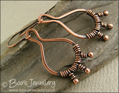 Antiqued copper bud wrapped teardrop loop earrings