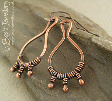 Antiqued copper bud wrapped teardrop loop earrings