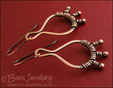 Antiqued copper bud wrapped teardrop loop earrings