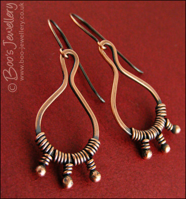 Antiqued copper bud wrapped teardrop loop earrings