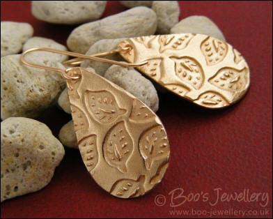 Bronze teardrop earrings with hand drawn leaf imprint