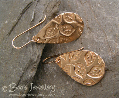 Bronze teardrop earrings with hand drawn leaf imprint