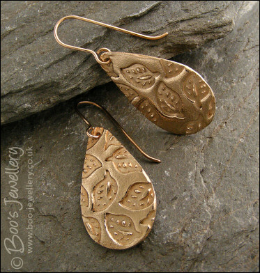 Bronze teardrop earrings with hand drawn leaf imprint