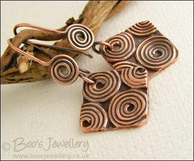 Antiqued copper spiral theme square earrings