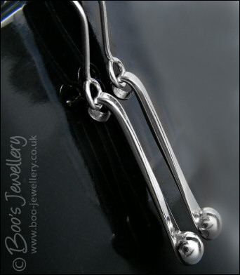 Sterling silver drop earrings with pebbles of solid silver