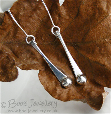 Sterling silver drop earrings with pebbles of solid silver