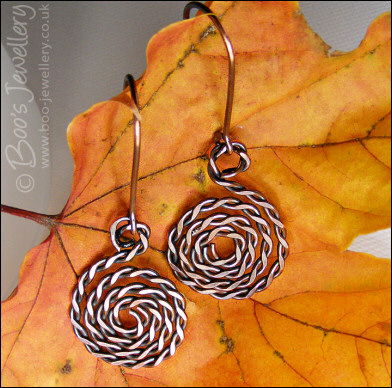 Twisted and hammered antiqued copper spiral earrings